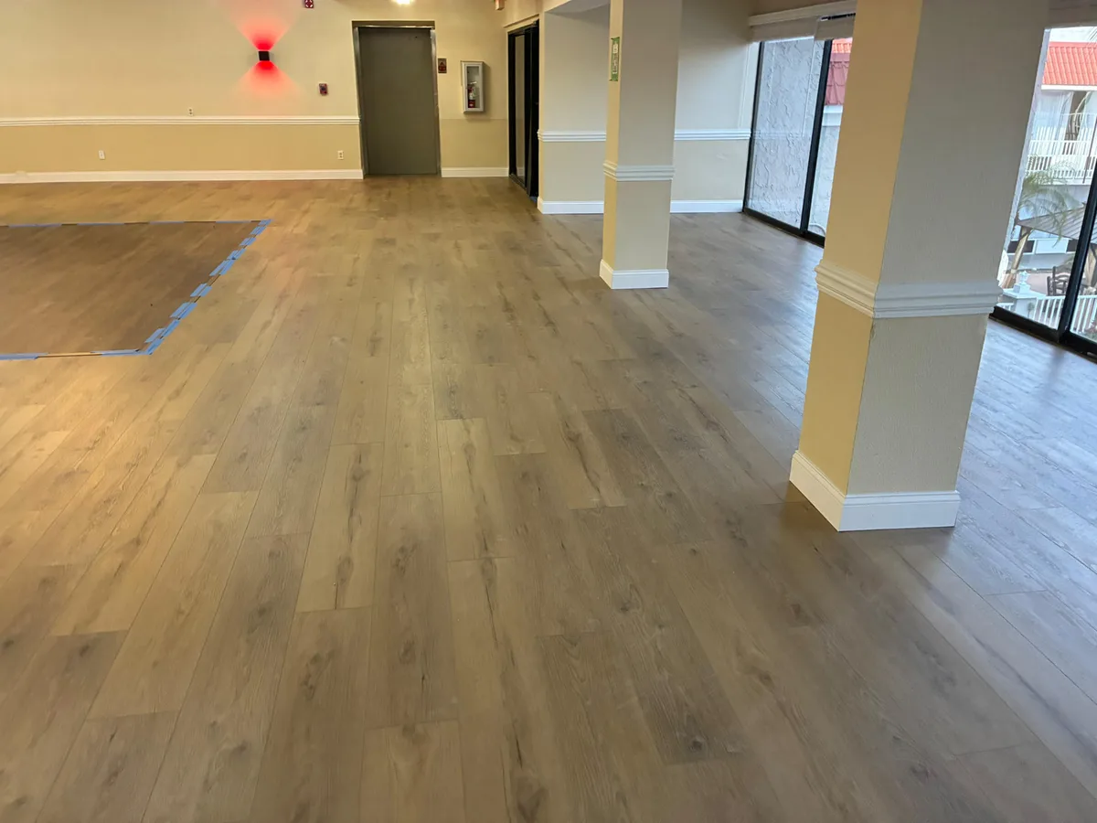 Commercial luxury vinyl plank flooring in a clubhouse space